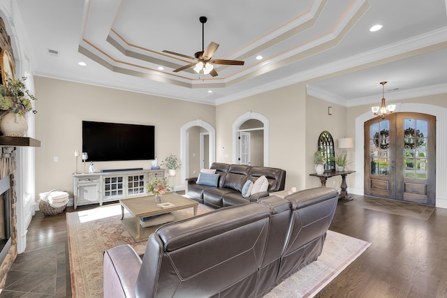 115 Gleneagles Rd, Campobello, SC 29322 - living area with arched walkways, french doors, ceiling fan, crown molding, and a stone fireplace