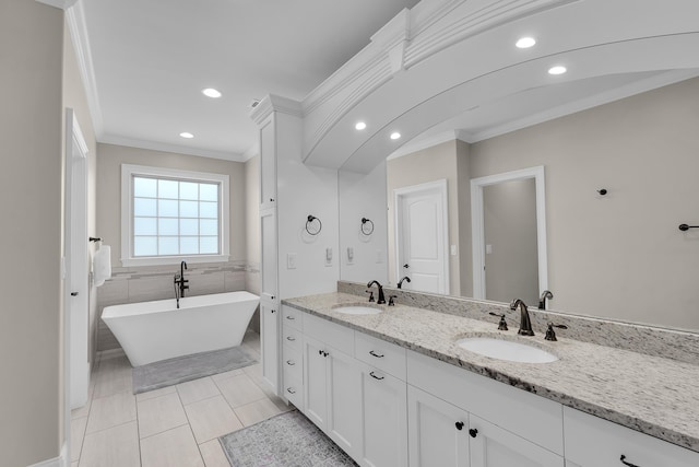 115 Gleneagles Rd, Campobello, SC 29322 - full bathroom with crown molding, double vanity, a freestanding bath, recessed lighting, and tile patterned floors