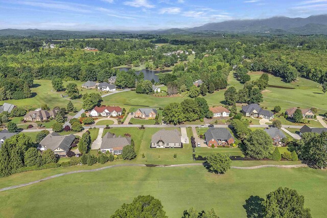 115 Gleneagles Rd, Campobello, SC 29322 - aerial view of property and surrounding area featuring a golf course, nearby suburban area, and a water and mountain view