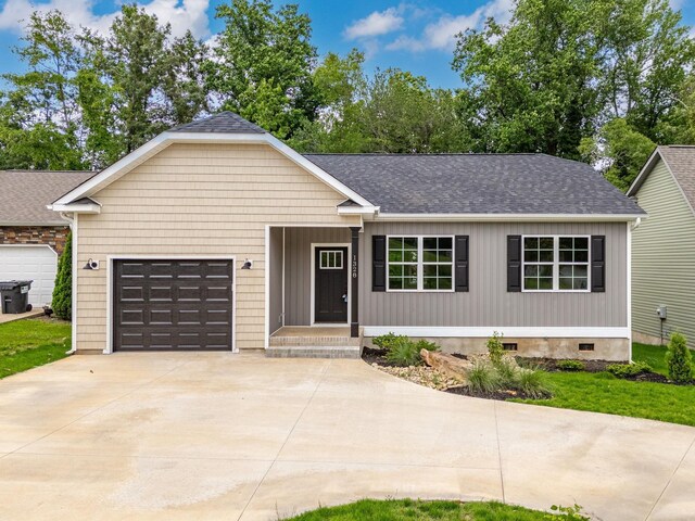 1328 Shoresbrook Rd, Spartanburg, SC 29301 - single story home with concrete driveway, a garage, roof with shingles, and crawl space