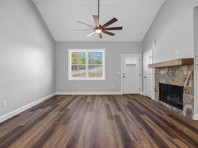 1328 Shoresbrook Rd, Spartanburg, SC 29301 - unfurnished living room featuring ceiling fan, a stone fireplace, high vaulted ceiling, and dark wood-type flooring