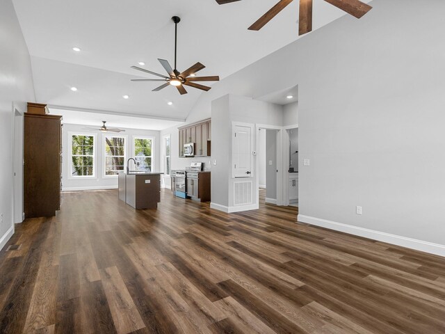 1328 Shoresbrook Rd, Spartanburg, SC 29301 - unfurnished living room with ceiling fan, vaulted ceiling, dark wood-type flooring, and recessed lighting