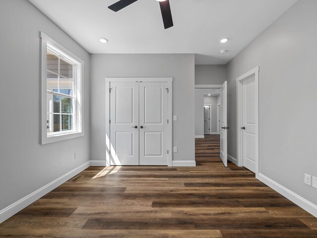 1328 Shoresbrook Rd, Spartanburg, SC 29301 - unfurnished bedroom with dark wood finished floors, a closet, recessed lighting, and a ceiling fan