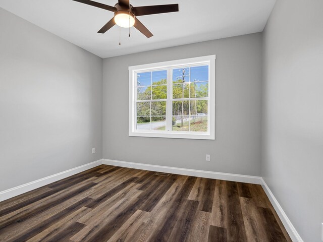 1328 Shoresbrook Rd, Spartanburg, SC 29301 - empty room with dark wood-type flooring and a ceiling fan