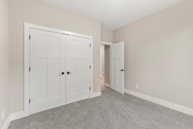 3135 E Croft Cir, Spartanburg, SC 29302 - unfurnished bedroom with light colored carpet and a closet