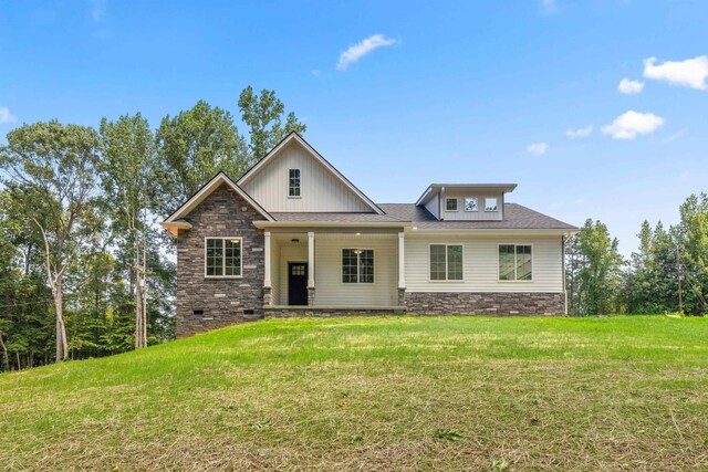 3135 E Croft Cir, Spartanburg, SC 29302 - craftsman-style home with stone siding, a front lawn, and a shingled roof