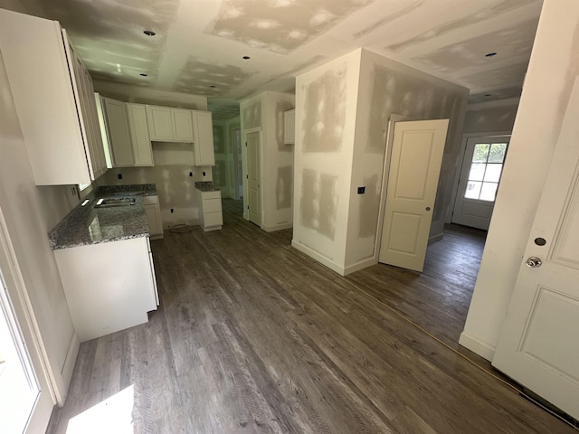 1320 Shoresbrook Rd, Spartanburg, SC 29301 - kitchen with white cabinetry, dark wood-type flooring, and dark stone countertops