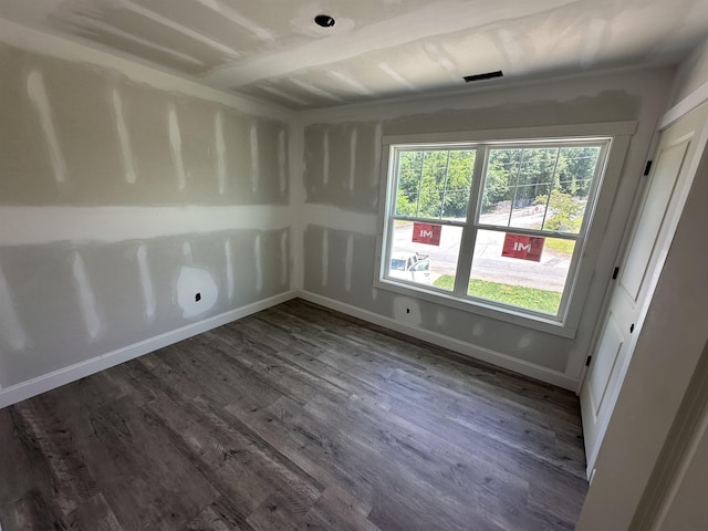1320 Shoresbrook Rd, Spartanburg, SC 29301 - empty room featuring dark wood-type flooring and baseboards
