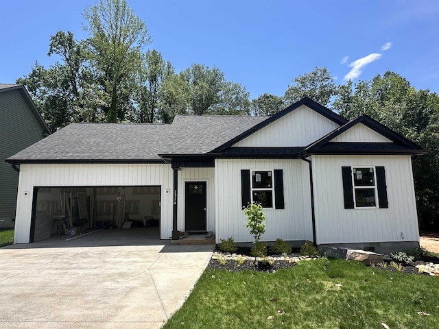 1314 Shoresbrook Rd, Spartanburg, SC 29301 - modern farmhouse style home featuring a garage, a shingled roof, driveway, and a front yard