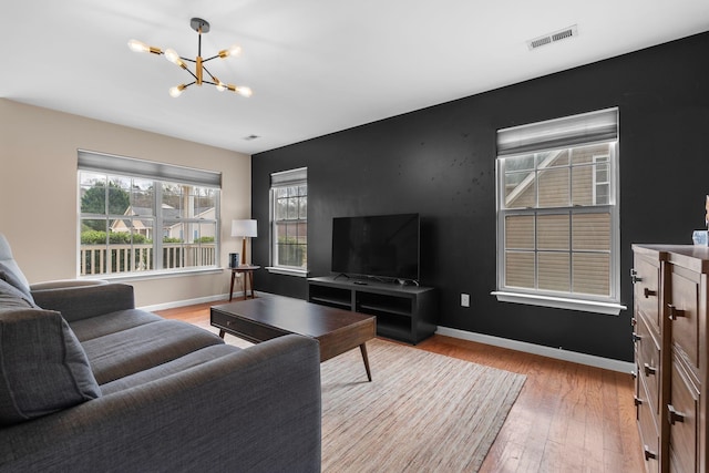 100 Maximus Dr, Greer, SC 29651 - living room featuring a chandelier and light wood finished floors