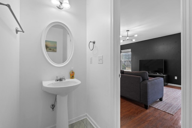 100 Maximus Dr, Greer, SC 29651 - bathroom with wood finished floors and baseboards