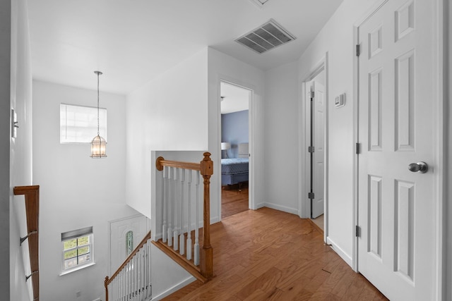 100 Maximus Dr, Greer, SC 29651 - hallway featuring an upstairs landing, wood finished floors, and a chandelier