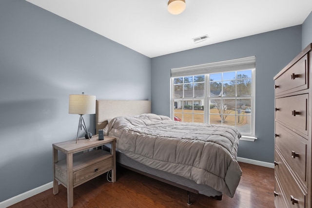 100 Maximus Dr, Greer, SC 29651 - bedroom with baseboards and dark wood finished floors