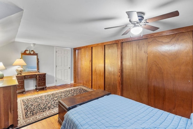 203 E S St, Union, SC 29379 - bedroom with light wood-type flooring, lofted ceiling, and ceiling fan