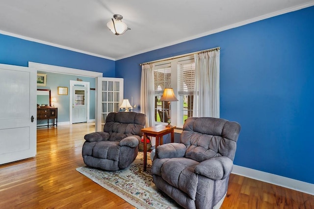 203 E S St, Union, SC 29379 - living area with wood finished floors and ornamental molding