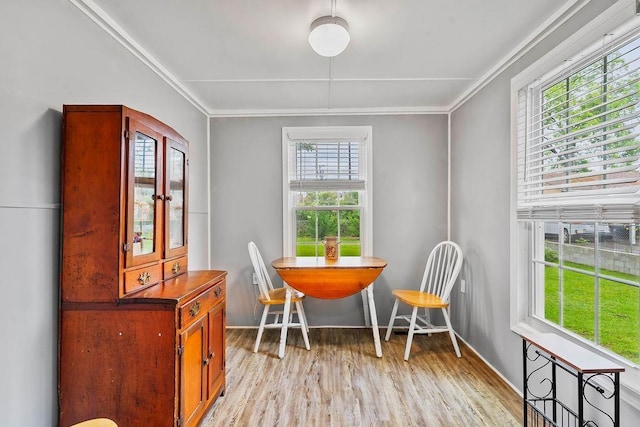 203 E S St, Union, SC 29379 - dining area with light wood finished floors and crown molding
