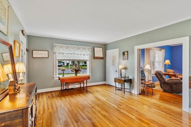 203 E S St, Union, SC 29379 - sitting room featuring crown molding and light wood-type flooring