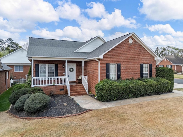 110 Hidden Ridge Dr, Spartanburg, SC 29301 - view of front facade with brick siding, covered porch, a front lawn, and roof with shingles
