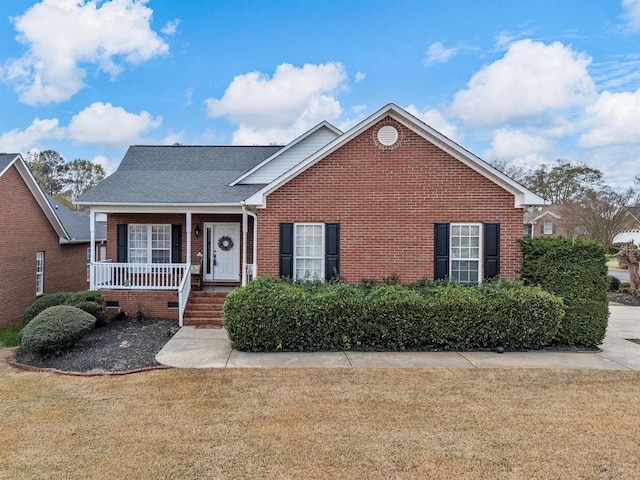 110 Hidden Ridge Dr, Spartanburg, SC 29301 - view of front of property with brick siding, covered porch, a front lawn, and a shingled roof