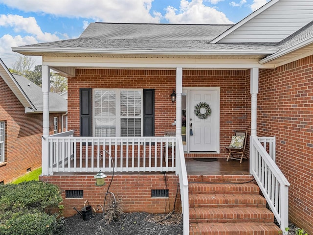 110 Hidden Ridge Dr, Spartanburg, SC 29301 - view of exterior entry with covered porch, brick siding, and roof with shingles