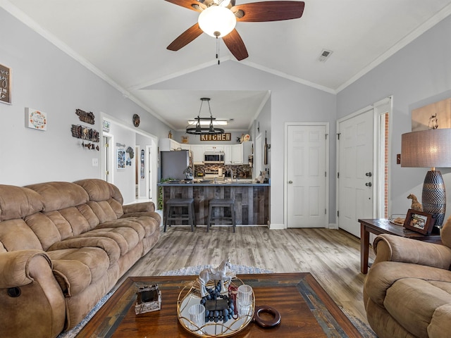 110 Hidden Ridge Dr, Spartanburg, SC 29301 - living area featuring wood finished floors, a ceiling fan, vaulted ceiling, and ornamental molding
