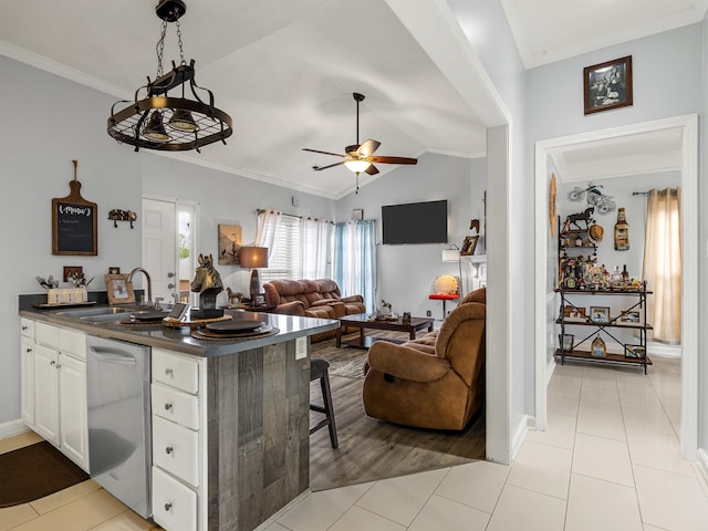 110 Hidden Ridge Dr, Spartanburg, SC 29301 - kitchen featuring stainless steel dishwasher, dark countertops, a ceiling fan, open floor plan, and white cabinets