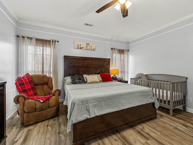 110 Hidden Ridge Dr, Spartanburg, SC 29301 - bedroom featuring crown molding, wood finished floors, and ceiling fan