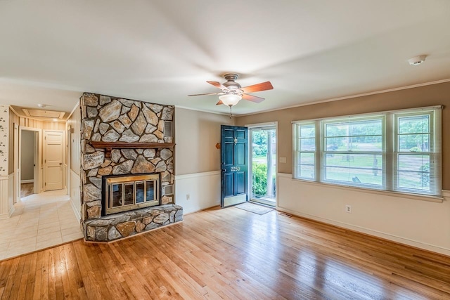 2250 Hickory Dr, Spartanburg, SC 29302 - unfurnished living room with attic access, a ceiling fan, wood finished floors, a fireplace, and crown molding