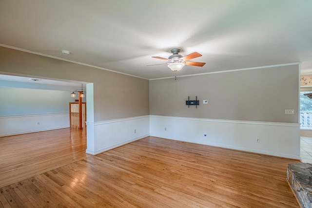 2250 Hickory Dr, Spartanburg, SC 29302 - spare room with ceiling fan, light wood-style flooring, crown molding, and a smoke detector