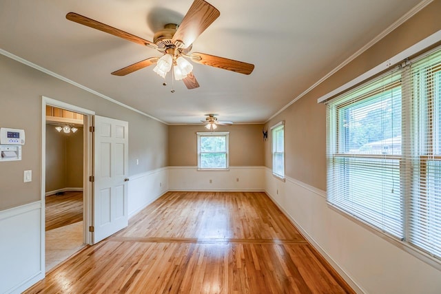 2250 Hickory Dr, Spartanburg, SC 29302 - spare room featuring light wood-style flooring, crown molding, and ceiling fan