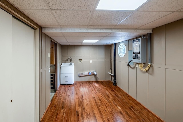 2250 Hickory Dr, Spartanburg, SC 29302 - laundry room with a decorative wall, wood finished floors, and electric panel
