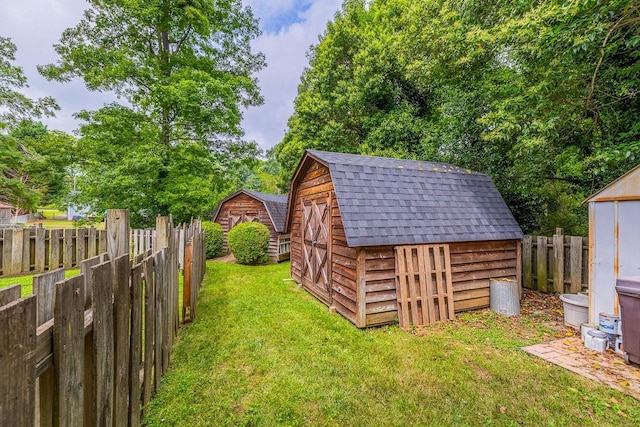 2250 Hickory Dr, Spartanburg, SC 29302 - fenced backyard featuring a storage unit