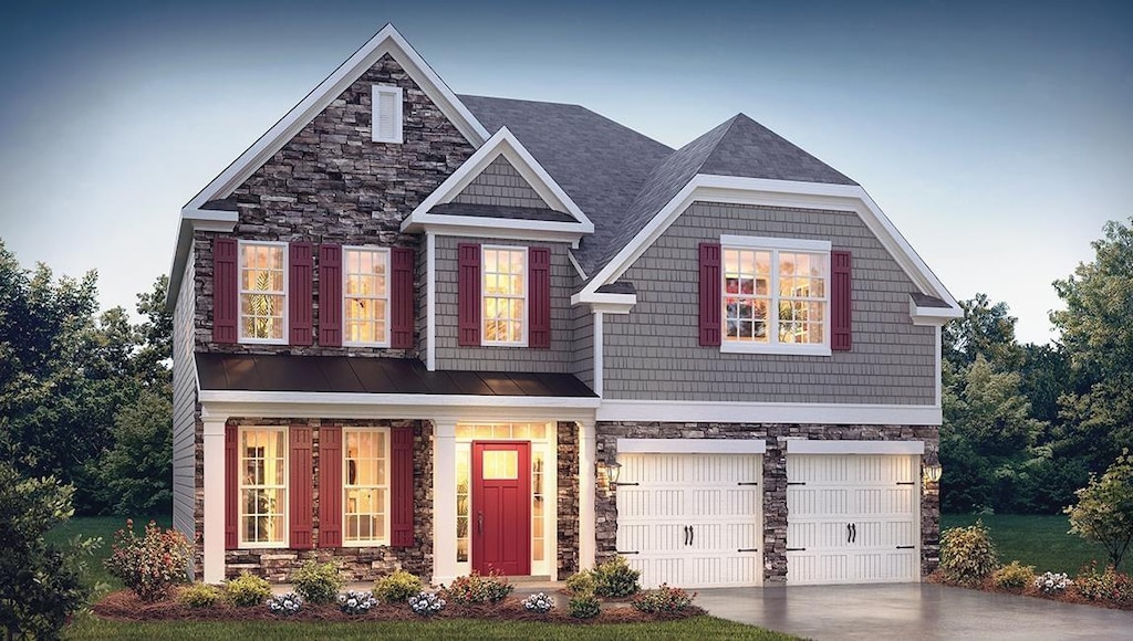 406 Fiery Rd, Mauldin, SC 29607 - craftsman-style home with stone siding, an attached garage, and driveway