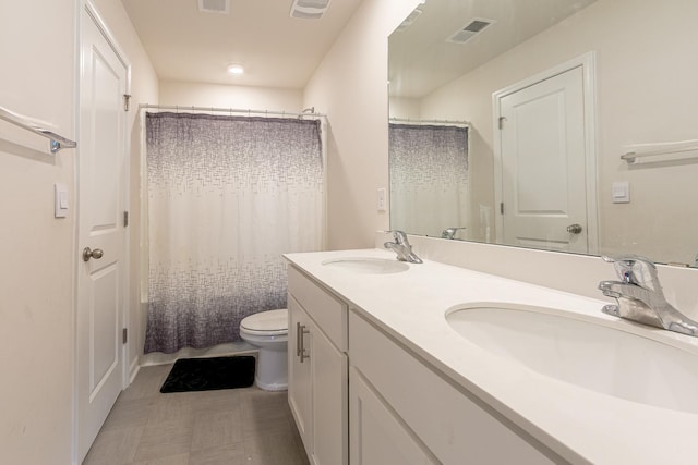 1262 Elterwater Ln, Spartanburg, SC 29306 - full bathroom featuring toilet and double vanity