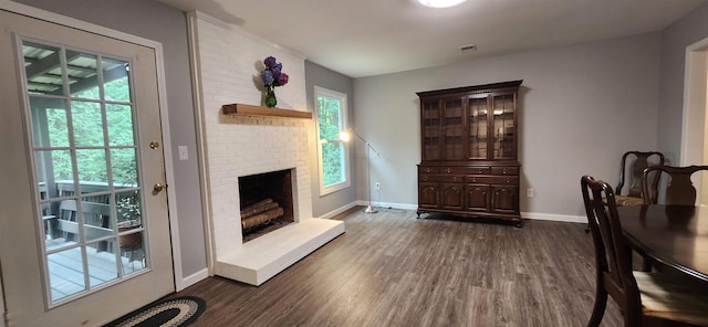 192 Wellesley Dr, Spartanburg, SC 29307 - living room featuring dark wood-style floors and a fireplace