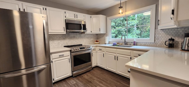 192 Wellesley Dr, Spartanburg, SC 29307 - kitchen featuring appliances with stainless steel finishes, light countertops, and white cabinetry