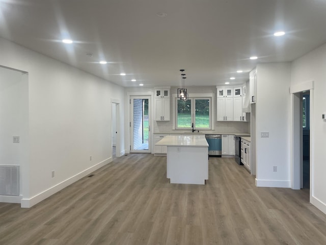 115 Hickory Hollow Rd, Inman, SC 29349 - kitchen featuring dishwasher, recessed lighting, white cabinetry, light countertops, and light wood-type flooring