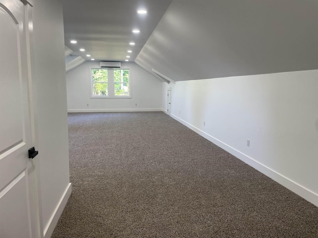 115 Hickory Hollow Rd, Inman, SC 29349 - additional living space featuring a wall unit AC, lofted ceiling, carpet, and recessed lighting