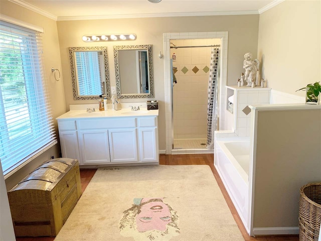107 S Poplar Ave, Landrum, SC 29356 - full bathroom featuring a shower stall, ornamental molding, a bath, and double vanity