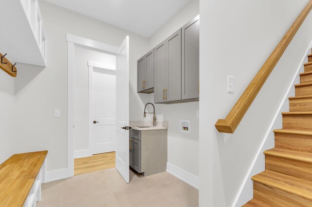 120 Thomason View Rd, Fountain Inn, SC 29644 - laundry room featuring cabinet space, washer hookup, and light tile patterned floors