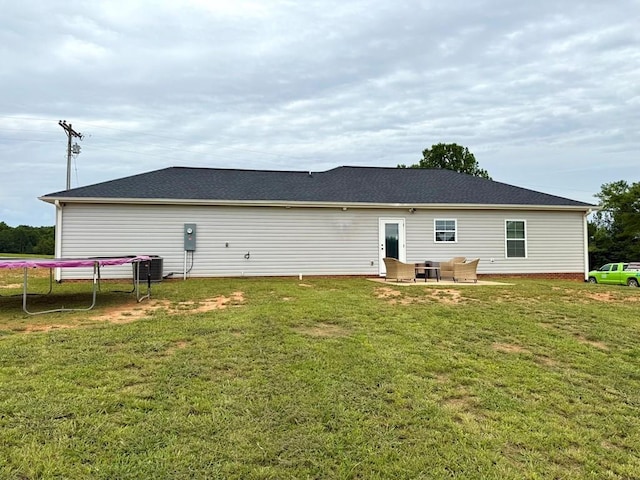 115 Rolling Mill Rd, Gaffney, SC 29340 - back of house with a trampoline, outdoor lounge area, a yard, and a patio