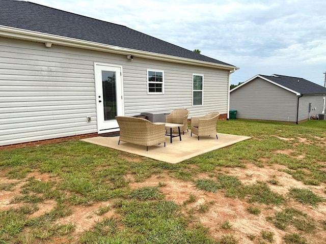 115 Rolling Mill Rd, Gaffney, SC 29340 - rear view of house with a patio area, a yard, and roof with shingles