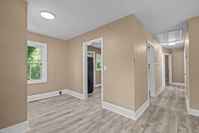 504 Hilda St, Spartanburg, SC 29306 - hallway with attic access, light wood-type flooring, and plenty of natural light