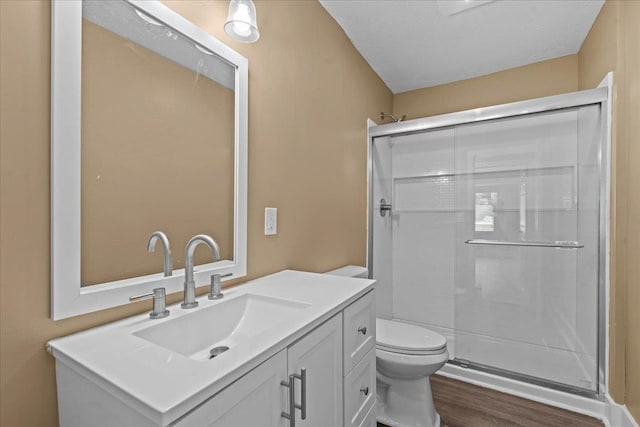 504 Hilda St, Spartanburg, SC 29306 - full bathroom with a shower stall, wood finished floors, and vanity