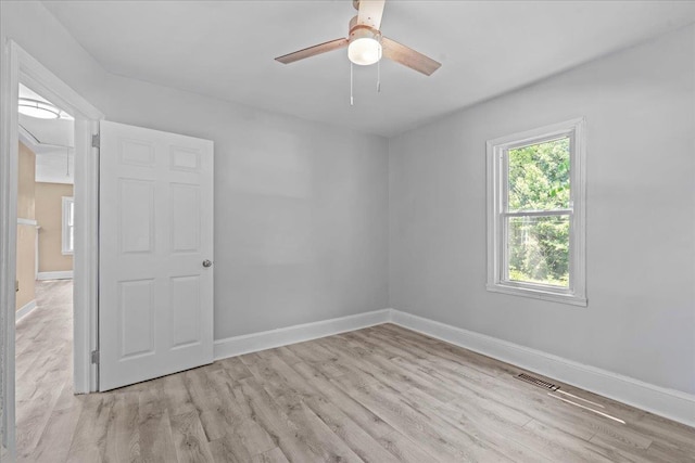504 Hilda St, Spartanburg, SC 29306 - spare room with wood finished floors and a ceiling fan