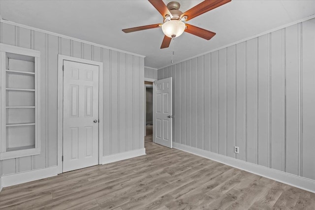 504 Hilda St, Spartanburg, SC 29306 - unfurnished bedroom featuring ornamental molding, wood finished floors, and ceiling fan