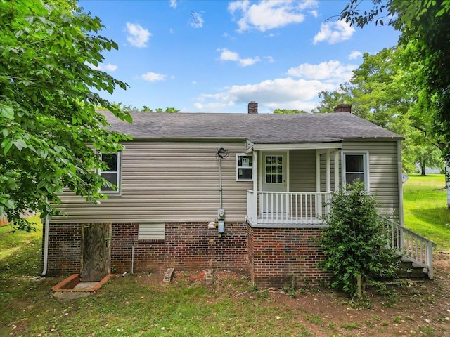 504 Hilda St, Spartanburg, SC 29306 - back of property with covered porch and a chimney