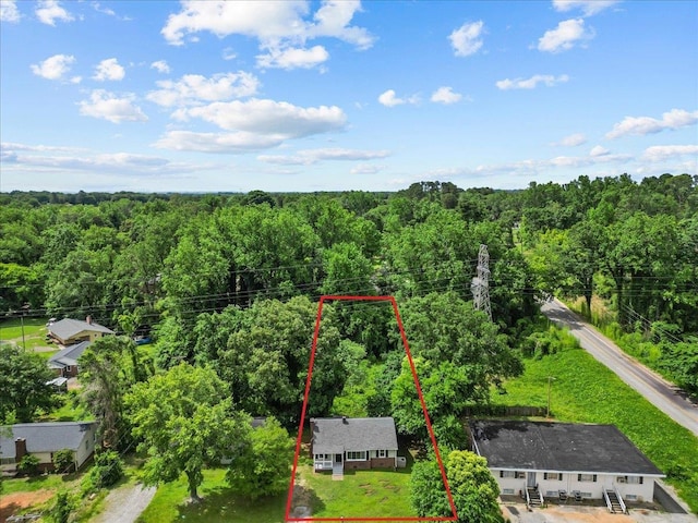 504 Hilda St, Spartanburg, SC 29306 - aerial view of property and surrounding area featuring a heavily wooded area and property parcel outlined