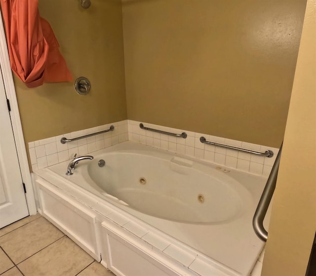 105 Anderson St, Spartanburg, SC 29301 - bathroom featuring a whirlpool tub and tile patterned floors