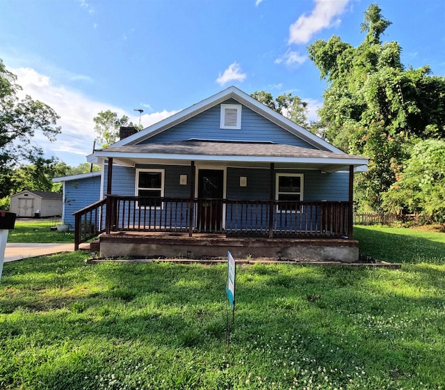 105 Anderson St, Spartanburg, SC 29301 - view of front of house featuring covered porch, a front yard, and a shingled roof